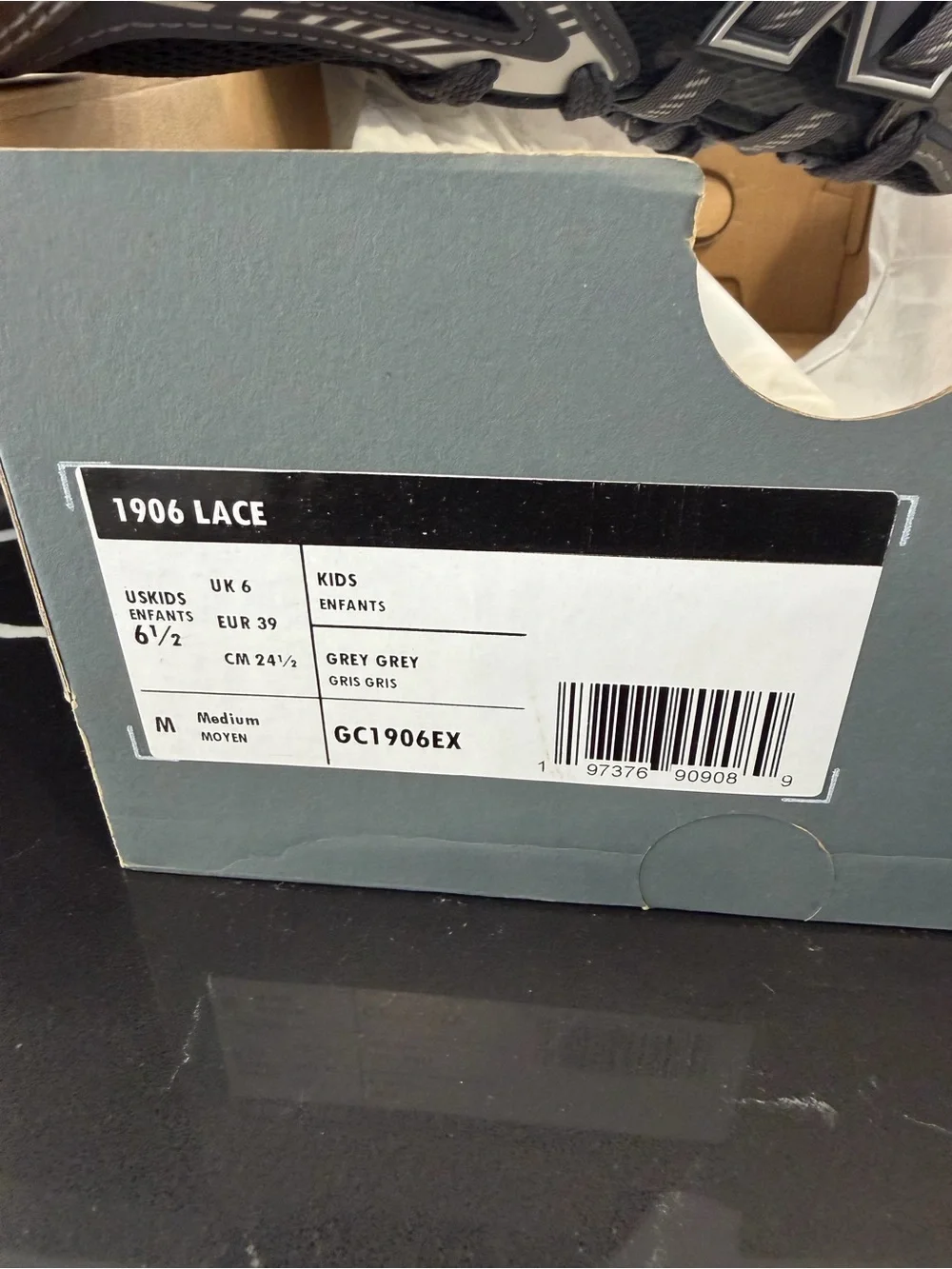 New Balance Black and Gray Lace-Up Sneakers